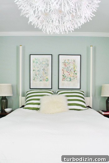 How to Hang Artwork Above a Bed: Placement and Tips 11 Close up of framed prints above bed