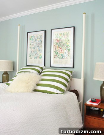 How to Hang Artwork Above a Bed: Placement and Tips 12 Layered look with chandelier
