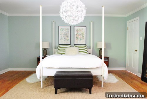 How to Hang Artwork Above a Bed: Placement and Tips 14 Wide shot of the bedroom