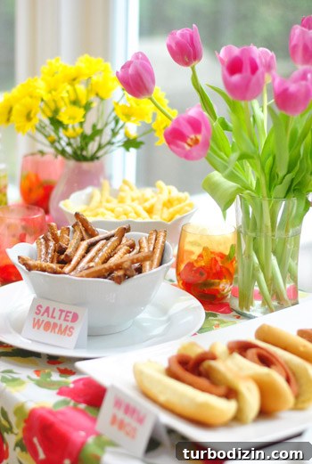 Worm-Themed Birthday Party Ideas and Decorations 6 Flowers on table