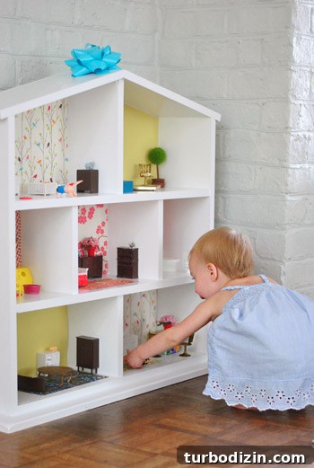 Little girl playing with Easy to Made DIY Dollhouse 
