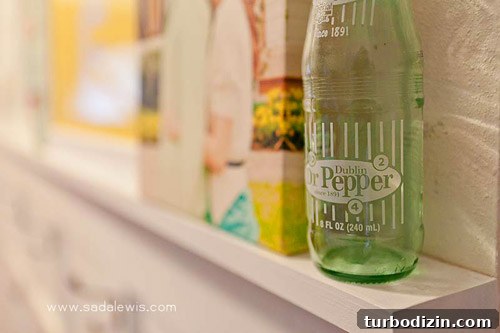 Board and Batten Entryway with Hooks: Step-by-Step Installation Guide 6 Shelves with bottles and keepsakes