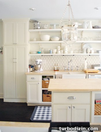 Breezy Bright House: Modern Coastal Home Tour 11 Kitchen with limestone countertops