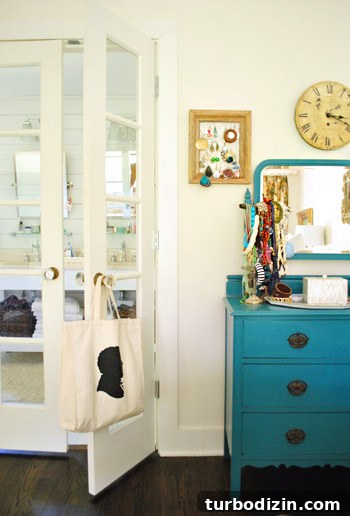 Breezy Bright House: Modern Coastal Home Tour 19 Dresser with blue accent