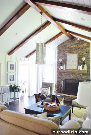 Breezy Bright House: Modern Coastal Home Tour 7 Lofted living room with pendant light