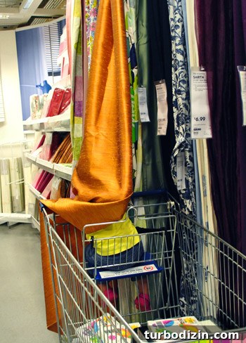 Discover Ikea’s Latest Releases: New Finds for Your Home 17 Clara looking at curtains