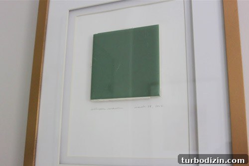Updating a Bathroom with Marble Tile and Beadboard: Design Tips 6 Framed original tile