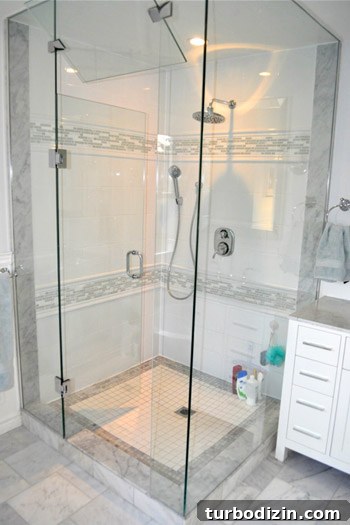 Dreamy White and Gray Bathroom with Elegant Box Molding 8 Goldendoodle in bathroom