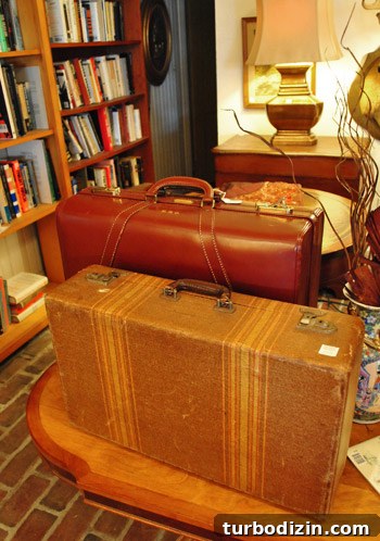 Beachfront Boutiques and Thrift Stores to Explore 16 Stacked vintage suitcases