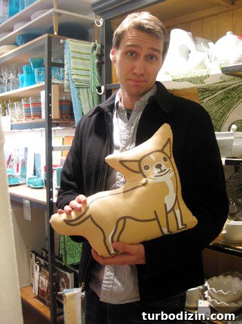 Beachfront Boutiques and Thrift Stores to Explore 23 Throwback photo of John with the same pillow