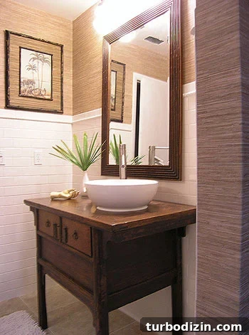 Remodeled bathroom with antique vanity