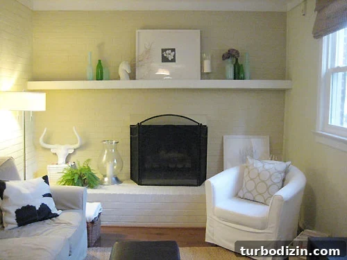 accessorizing-your-fireplace Adding vases and bottles to mantel