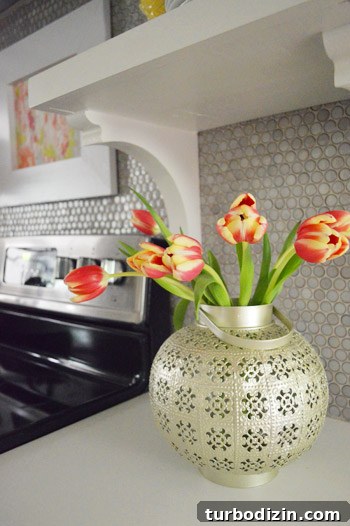 Affordable Tulip Arrangements: Creative Ideas for Spring 7 Tulips in a tin lantern with glass cup