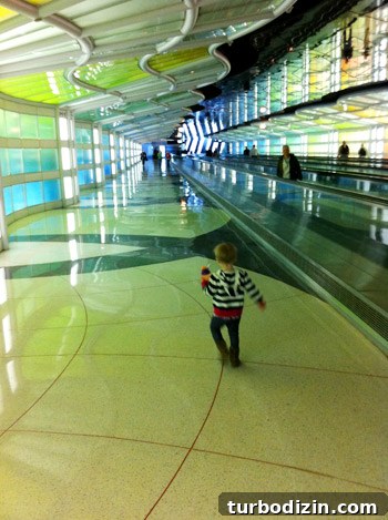 flying with toddler playing in the airport with cool lights