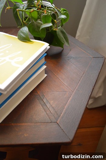 Styled accent table with books and plant