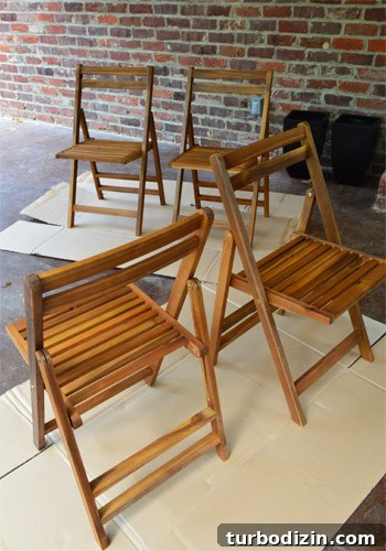 Protect Outdoor Furniture: Varnish vs. Teak Oil Guide 7 Wooden outdoor chair before oiling