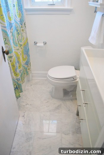 Teal Glass Tile Bathroom Refresh: Small Remodel Ideas and Tips 6 Carrera marble floor