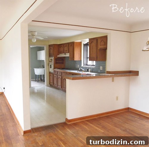 White Kitchen Remodel: White Tile and Butcher Block Island 2 Before and after kitchen photo 1