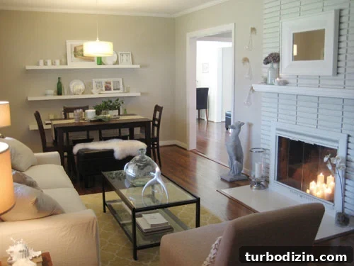 What We'd Do Differently If We Bought Our First House Again 2 Living Room In First House With Cream Walls And Painted Brick Fireplace