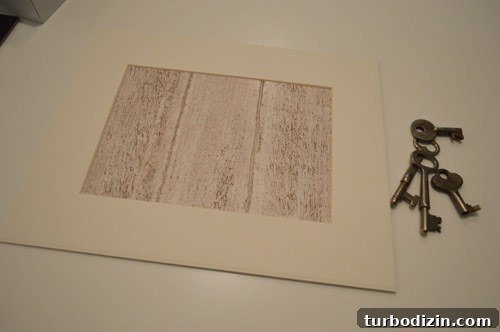 Create Shadowbox Art with Personal Keepsakes 4 Taped background behind frame mat