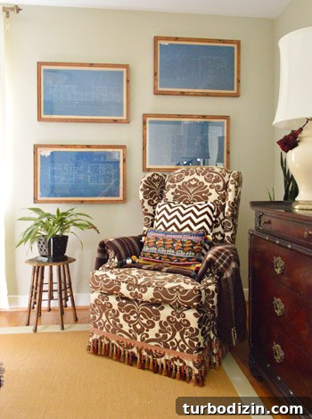 Bedroom with framed blueprints