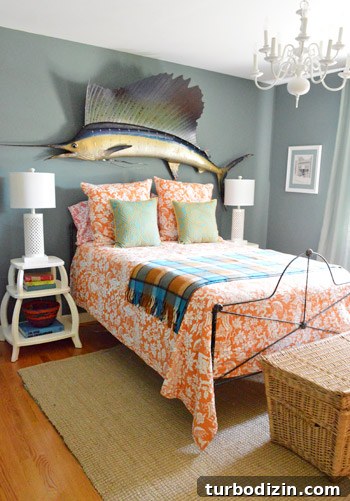 Guest room with sailfish and patterned bedding