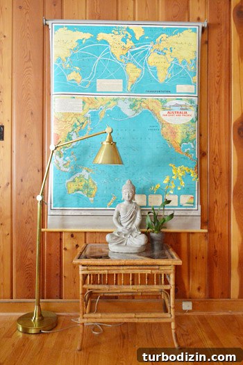 Teal map with gold lamp