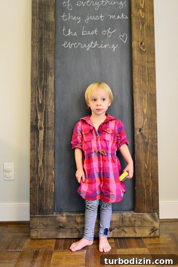 DIY Large Magnetic Chalkboard: Step-by-Step Guide for Home Projects 12 Child drawing on chalkboard