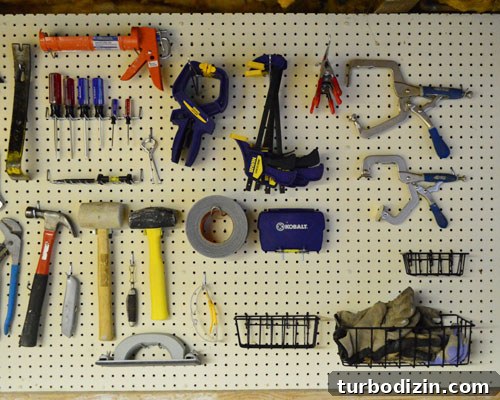 Organize Your Tools with a Pegboard: Smart Workshop Storage Ideas 9 Organized pegboard and shelf