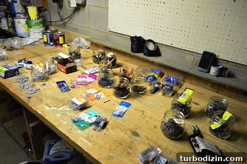 Organize Your Tools with a Pegboard: Smart Workshop Storage Ideas 11 Hardware sorted into mason jars