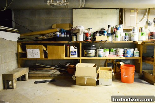 Organize Your Tools with a Pegboard: Smart Workshop Storage Ideas 17 Wall of paint cans