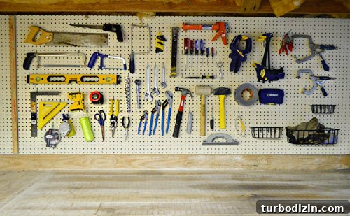 Organize Your Tools with a Pegboard: Smart Workshop Storage Ideas 7 Tools hung on pegboard