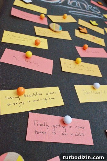 Create a Thanksgiving Gratitude Chalkboard for Your Home 11 Close up of Thanksgiving gratitude notes on magnetic DIY chalkboard