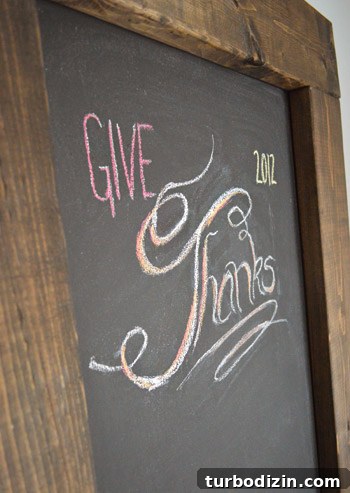 Create a Thanksgiving Gratitude Chalkboard for Your Home 3 Give Thanks chalk lettering on DIY magnetic chalkboard with wood framed