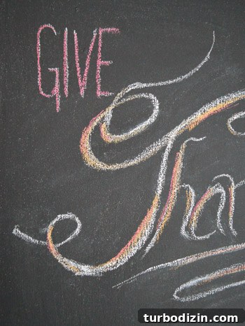 Create a Thanksgiving Gratitude Chalkboard for Your Home 4 Close up of Give Thanks chalk lettering on DIY magnetic chalkboard