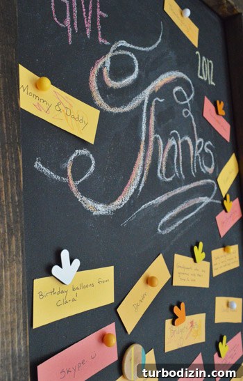 Create a Thanksgiving Gratitude Chalkboard for Your Home 7 Large leaning chalkboard with Give Thanks lettering with notecards of gratitude