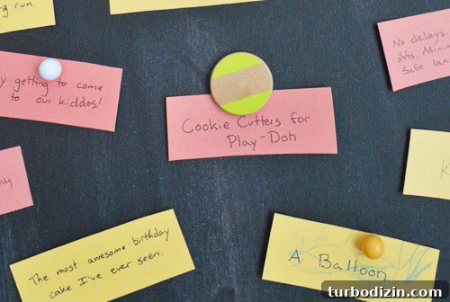 Create a Thanksgiving Gratitude Chalkboard for Your Home 9 Colorful Thanksgiving themed gratitude notes held to magnetic DIY chalkboard