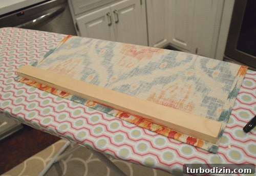 DIY Window Shade in 15 Minutes: Quick Step-by-Step Guide 8 small piece of wood atop back side of window shade fabric