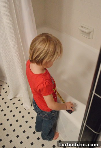 DIY Window Shade in 15 Minutes: Quick Step-by-Step Guide 9 young girl playing with tape measure