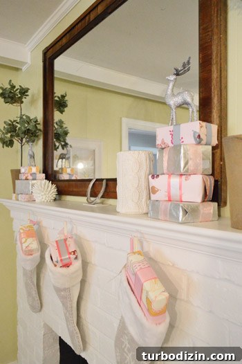 Mantel decorated for the holidays with stockings and presents