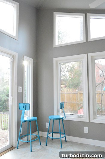 How to Paint Very High Vaulted Ceilings Safely and Efficiently 16 Blue stools in corner