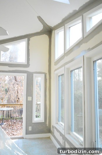 How to Paint Very High Vaulted Ceilings Safely and Efficiently 10 Painting around windows and doors