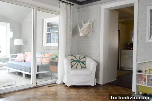 Sunroom painted brick - after