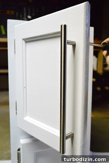 Turn an Old Cabinet Into a Realistic Play Refrigerator for Kids 10 Reattached doors with hardware