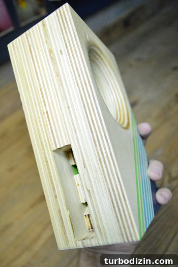 How to Hang a Pegboard in Your Basement Workshop 6 Phone dock close-up