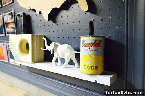 How to Hang a Pegboard in Your Basement Workshop 8 Pen holder and decorative items on pegboard shelf