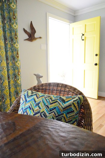 dining room with pillows and curtains