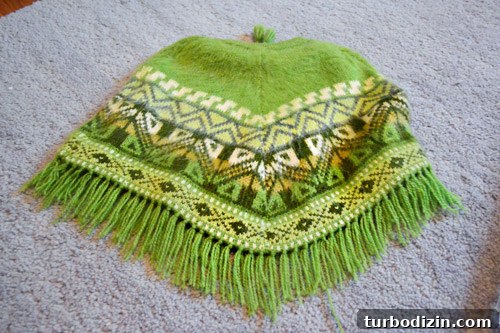 Framing Kids’ Clothes and Adding Playful Wall Hooks for Decor 2 Peruvian poncho framed