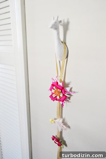 Framing Kids’ Clothes and Adding Playful Wall Hooks for Decor 13 Hooks and play area