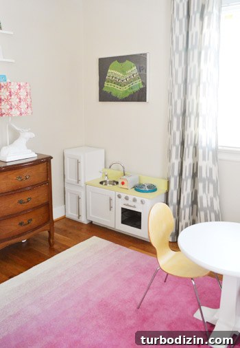 Framing Kids’ Clothes and Adding Playful Wall Hooks for Decor 9 Poncho in room context
